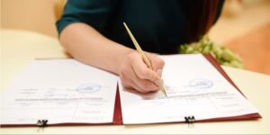 Sign the form in front of a Registrar of Marriages